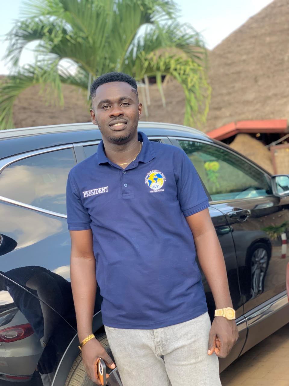 IWF President in a branded navy polo shirt