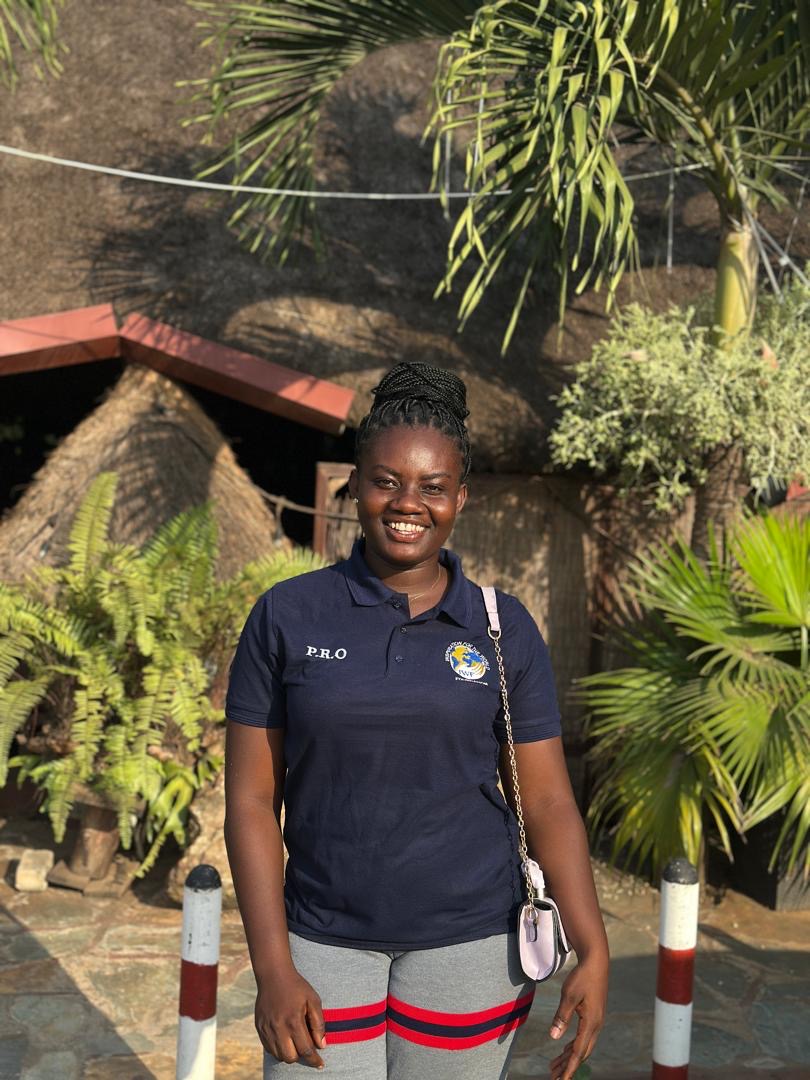 IWF Public Relations Officer in a branded navy polo shirt